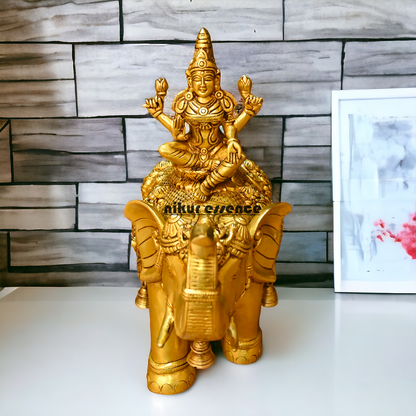 Buy Bass Statue of Lakshmi Seated Gracefully on an Elephant with Trunk Raised – Symbol of Prosperity, Abundance, and Divine Blessings Idols Nikuressence