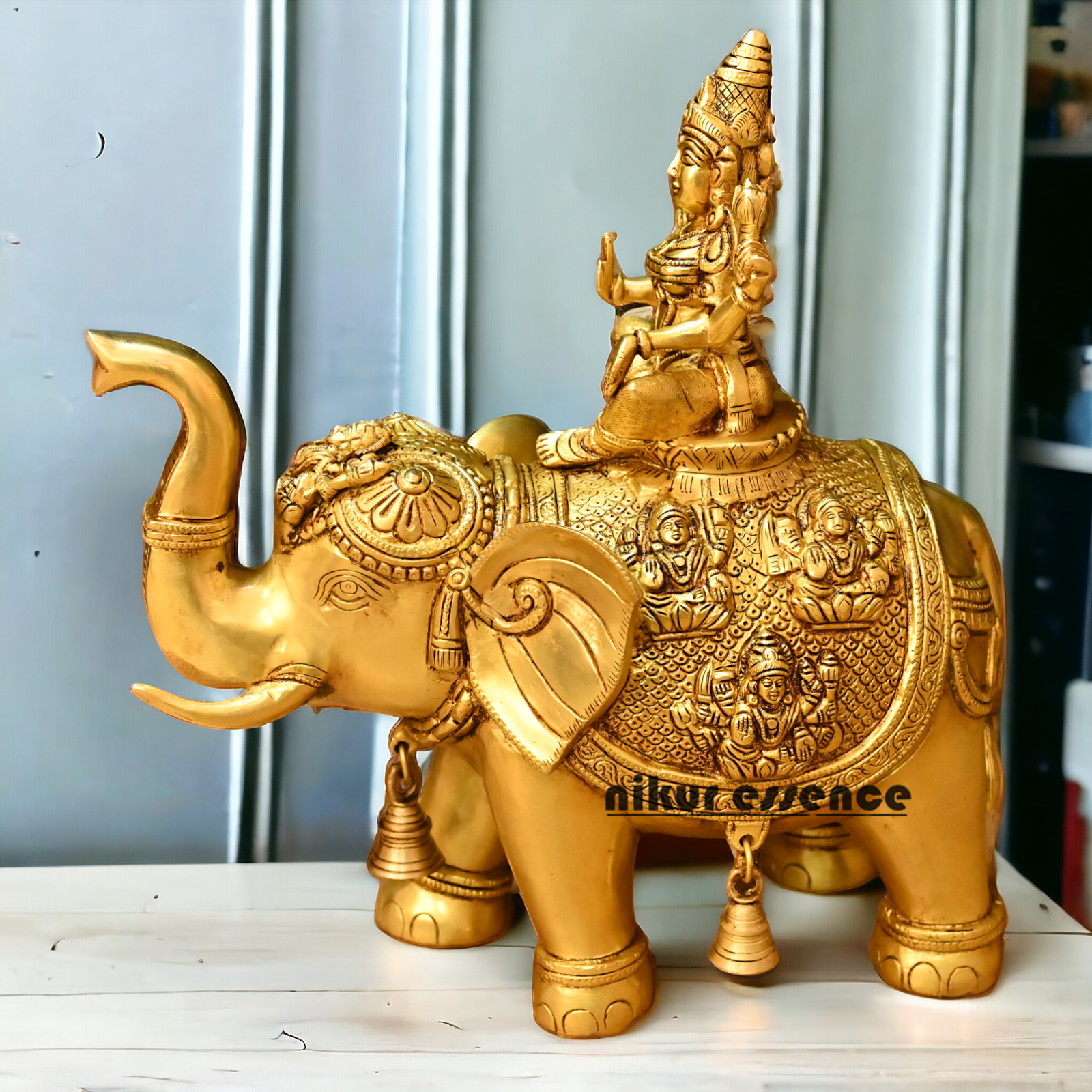 Buy Bass Statue of Lakshmi Seated Gracefully on an Elephant with Trunk Raised – Symbol of Prosperity, Abundance, and Divine Blessings Idols Nikuressence