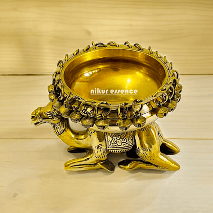 Buy online brass 20 cm Camel Design Traditional Indian Urli – Handcrafted Brass Decorative Bowl with Unique Camel Motif by Nikur Essence Idols Nikuressence