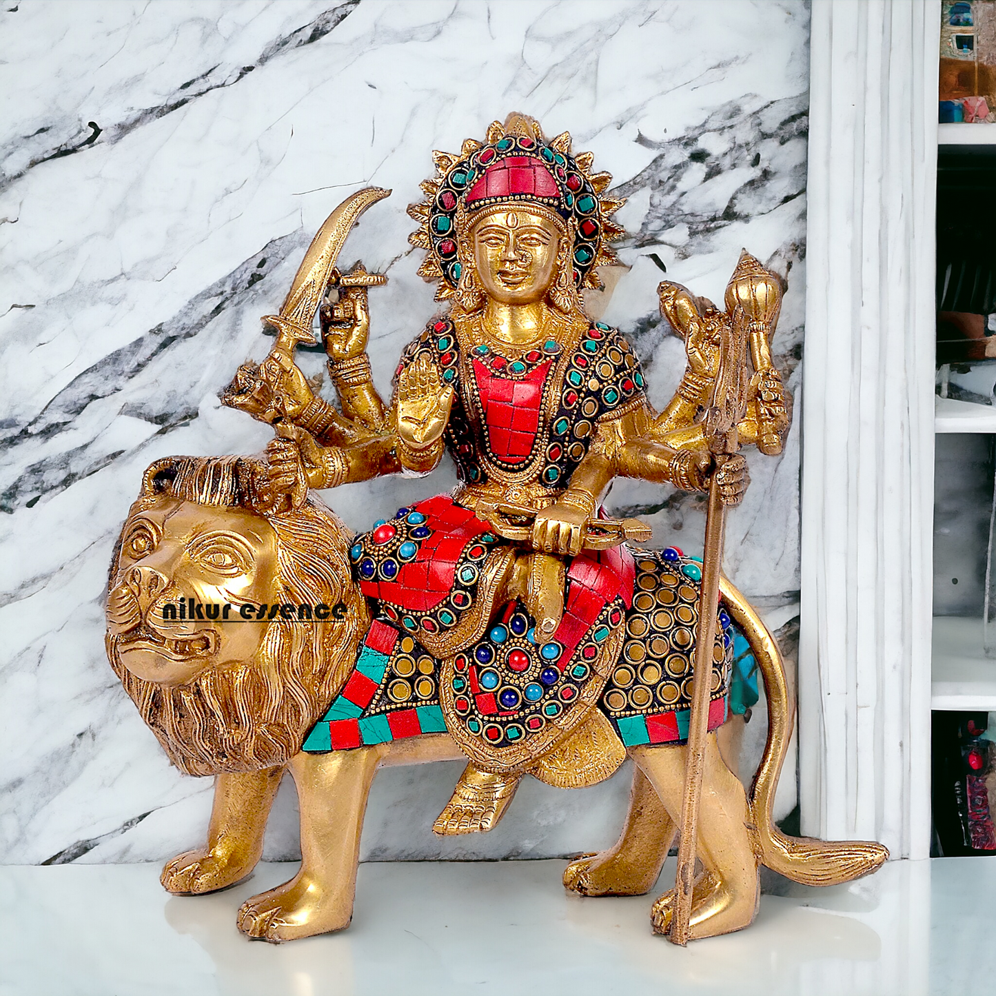 Buy Brass Sculpture of Mother Goddess Durga Seated on a Majestic Lion – 25.4 cm, An Intricate Work of Art by Nikur Essence