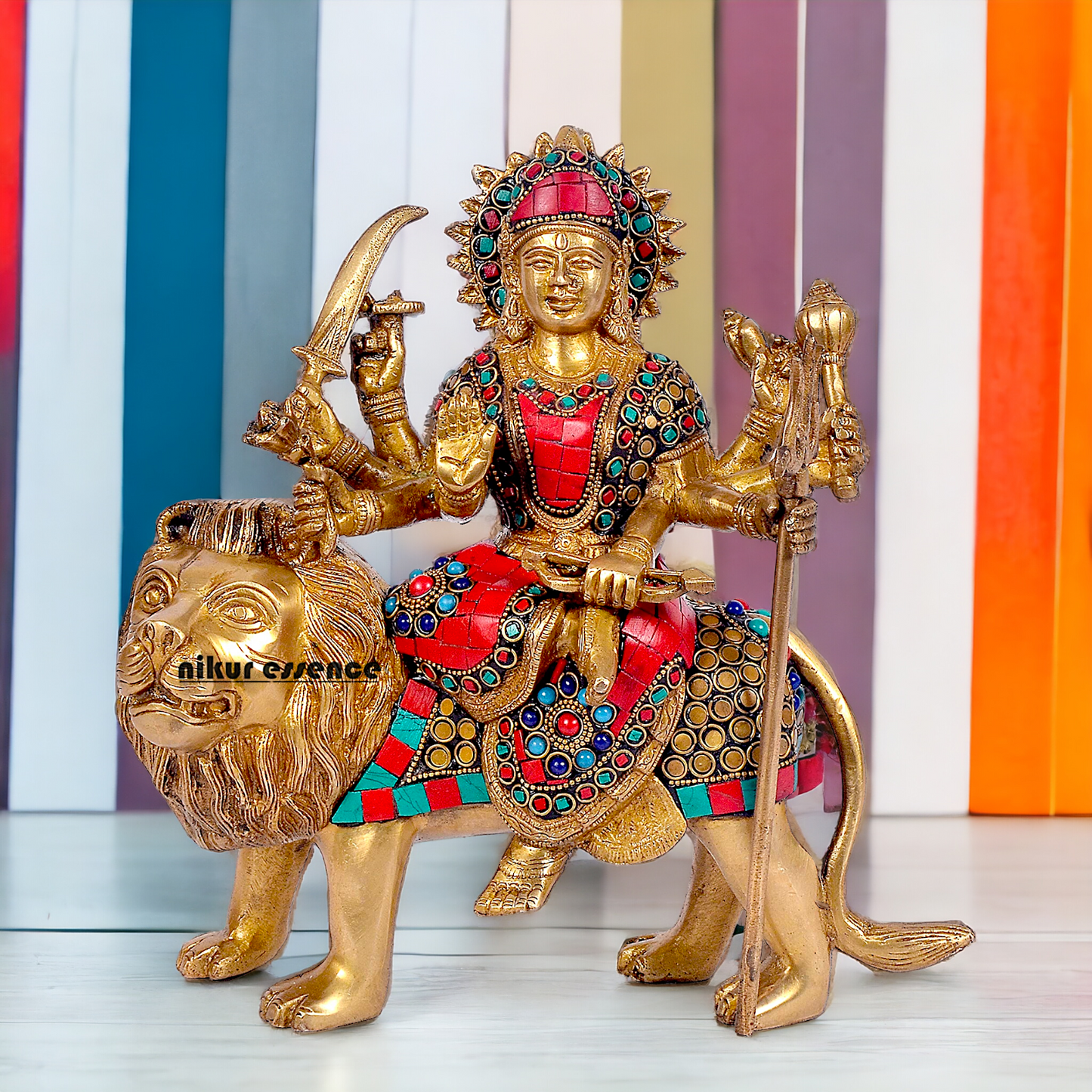 Buy Brass Sculpture of Mother Goddess Durga Seated on a Majestic Lion – 25.4 cm, An Intricate Work of Art by Nikur Essence