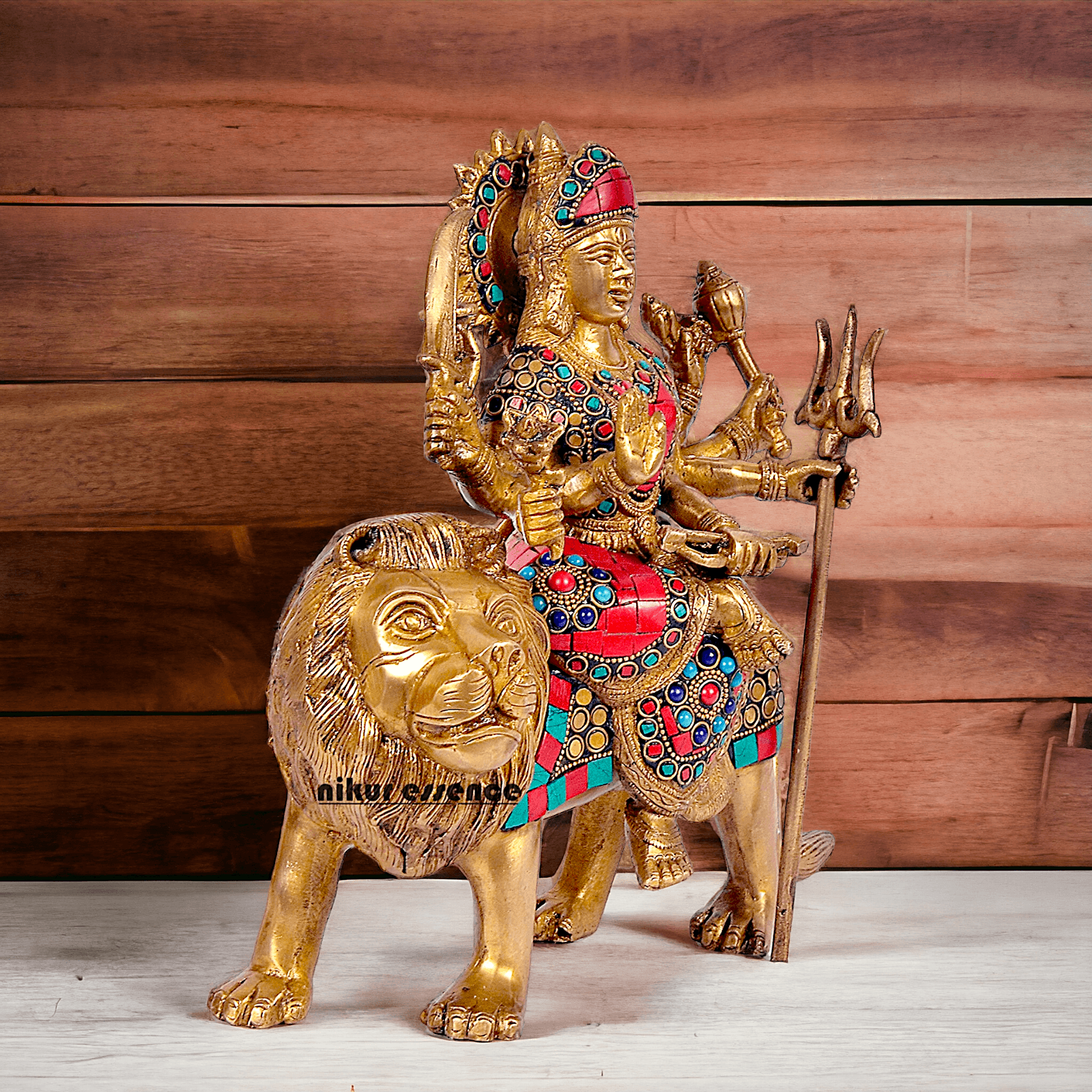 Buy Brass Sculpture of Mother Goddess Durga Seated on a Majestic Lion – 25.4 cm, An Intricate Work of Art by Nikur Essence