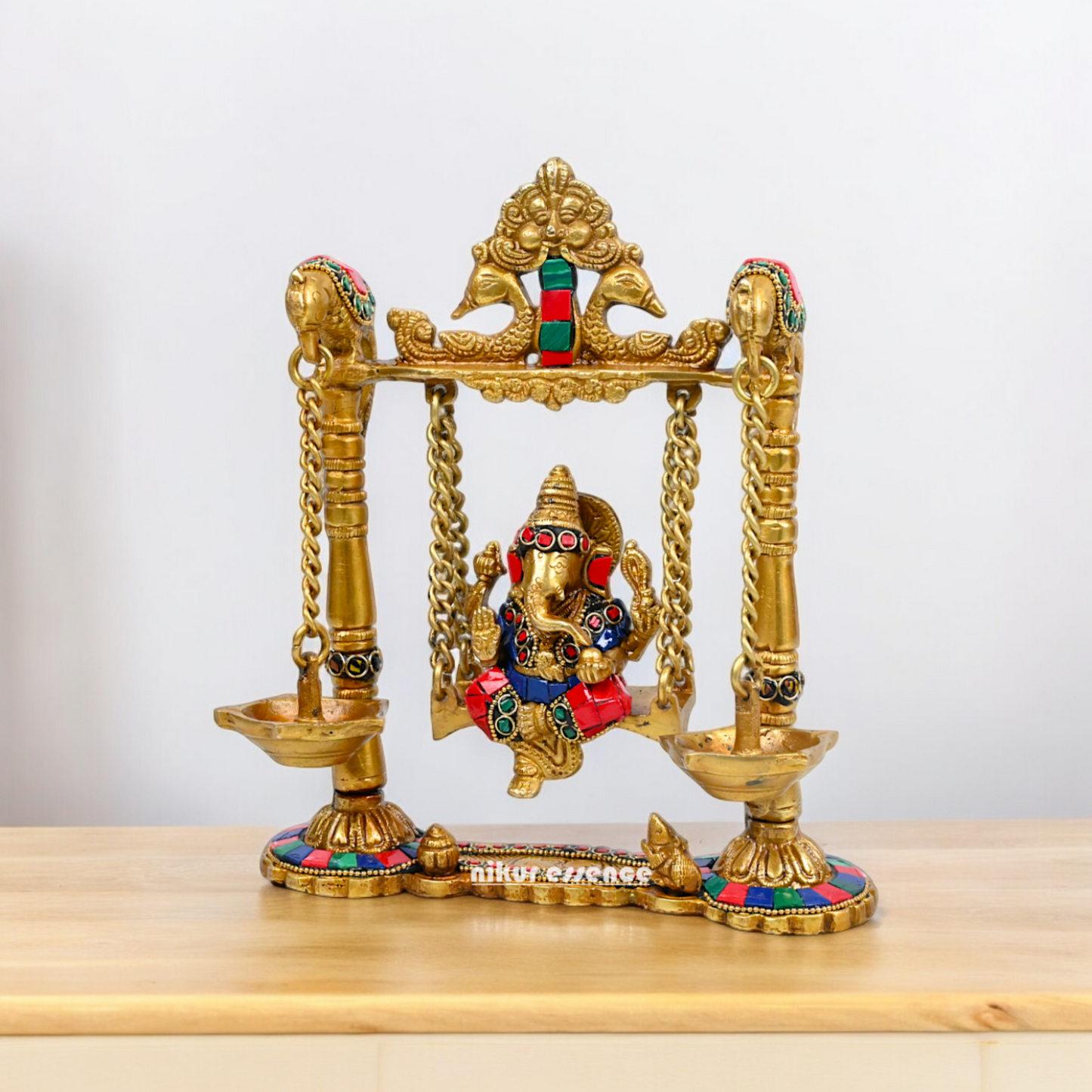 Buy Brass Ganesh Bhagwan Jhula with Two Diyas – Handcrafted Ganesha Idol 22.9 cm Idols Nikuressence