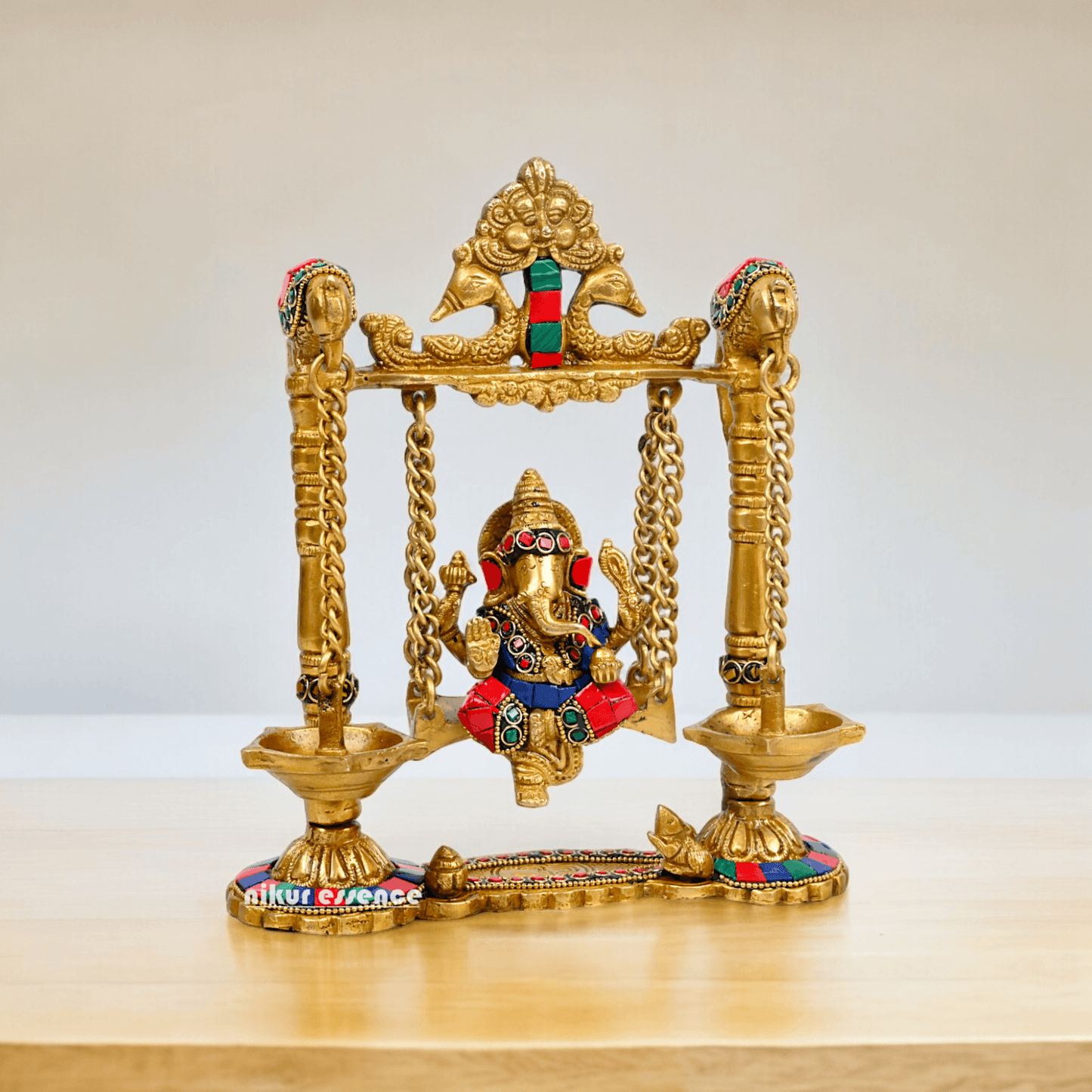 Buy Brass Ganesh Bhagwan Jhula with Two Diyas – Handcrafted Ganesha Idol 22.9 cm Idols Nikuressence