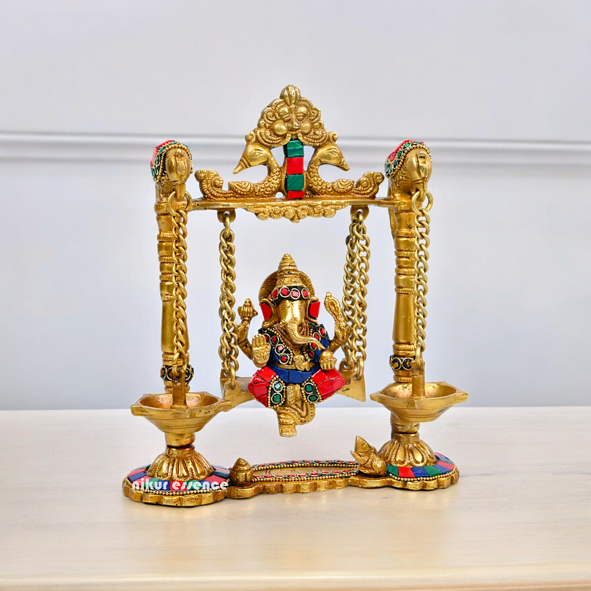 Buy Brass Ganesh Bhagwan Jhula with Two Diyas – Handcrafted Ganesha Idol 22.9 cm Idols Nikuressence