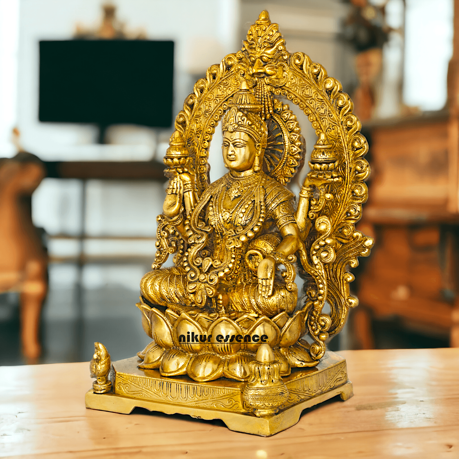 Pure Brass Lakshmi Seated on Lotus Throne with Kirtimukha Prabhawali , Hindu Divine Artwork for Home Altar Decor and Spiritual Grace