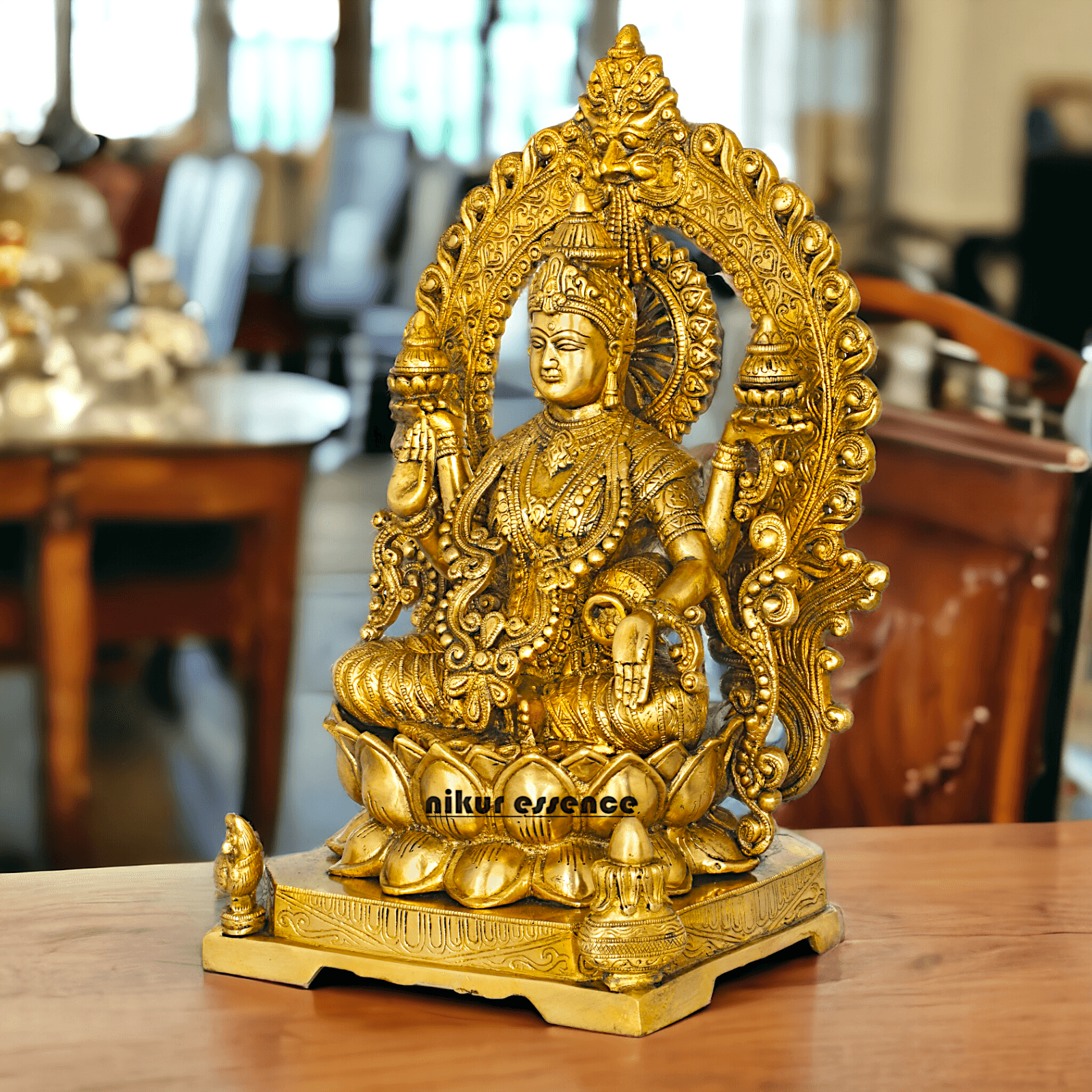 Pure Brass Lakshmi Seated on Lotus Throne with Kirtimukha Prabhawali , Hindu Divine Artwork for Home Altar Decor and Spiritual Grace