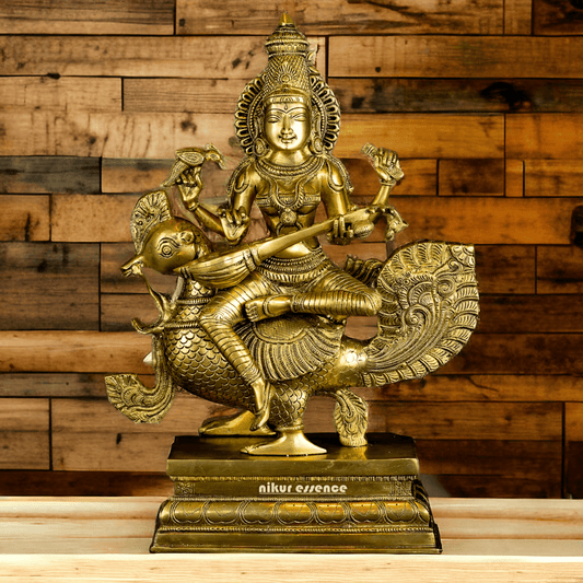 Pure Brass Saraswati Sitting on Swan Figurine - Hindu Goddess of Knowledge, Arts, and Wisdom, Handcrafted Decorative Statue for Home Altar or Office Brass Nikuressence