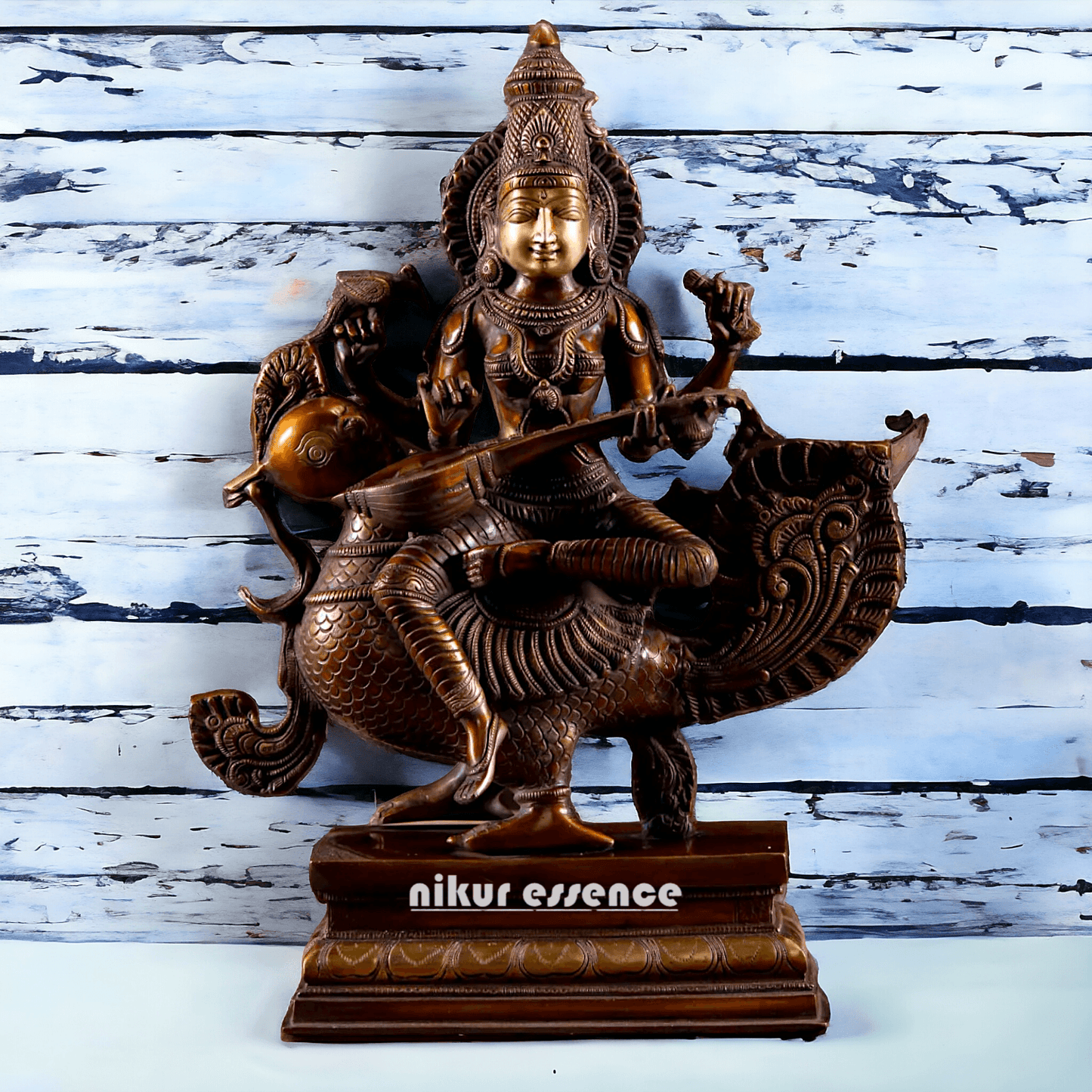 Brass Statue of Hindu Goddess Saraswati, the Patron of Wisdom, Playing Veena atop a Majestic Peacock with a Parrot Perched on Her Hand, 20 Inches