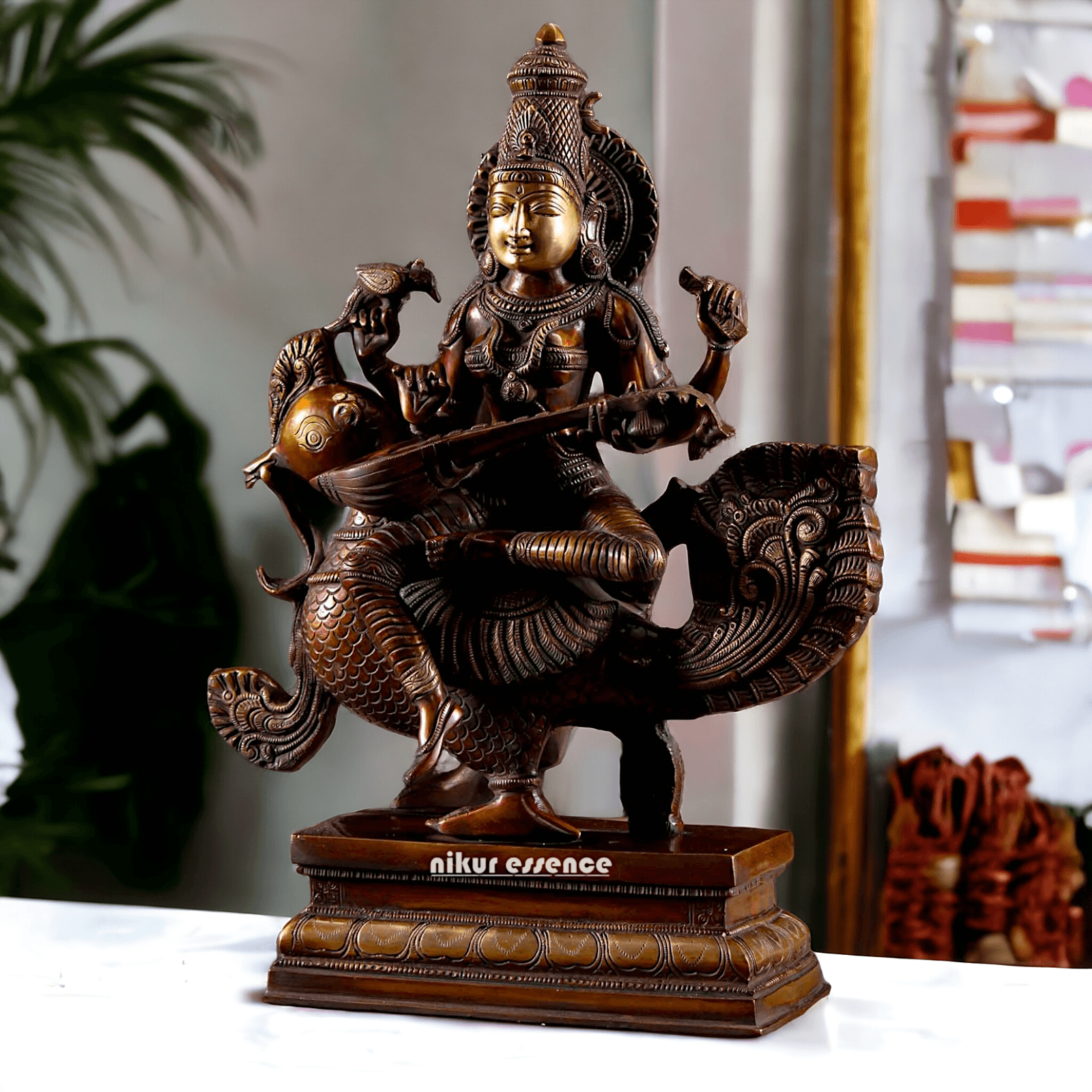 Brass Statue of Hindu Goddess Saraswati, the Patron of Wisdom, Playing Veena atop a Majestic Peacock with a Parrot Perched on Her Hand, 20 Inches