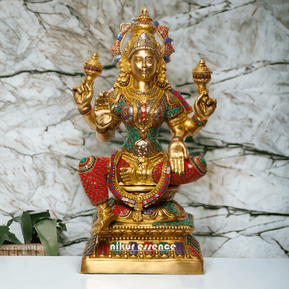 Buy Online Brass Statue of Lakshmi, Sitting Gracefully with Four Arms, Adorned with Intricate Inlay Work