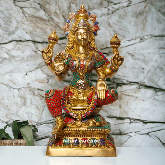 Buy Online Brass Statue of Lakshmi, Sitting Gracefully with Four Arms, Adorned with Intricate Inlay Work Brass Nikuressence