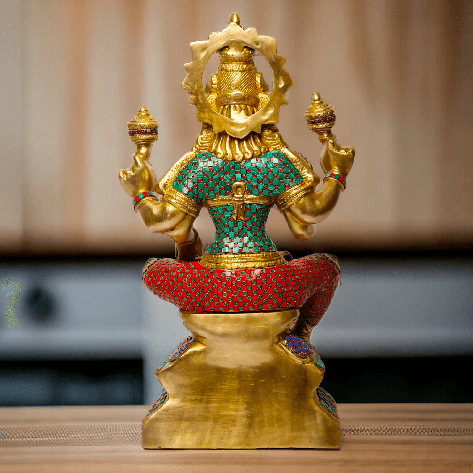 Buy Online Brass Statue of Lakshmi, Sitting Gracefully with Four Arms, Adorned with Intricate Inlay Work