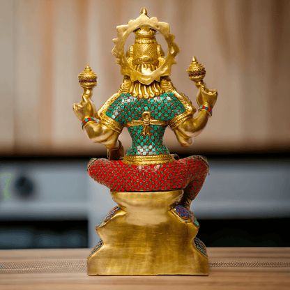 Buy Online Brass Statue of Lakshmi, Sitting Gracefully with Four Arms, Adorned with Intricate Inlay Work