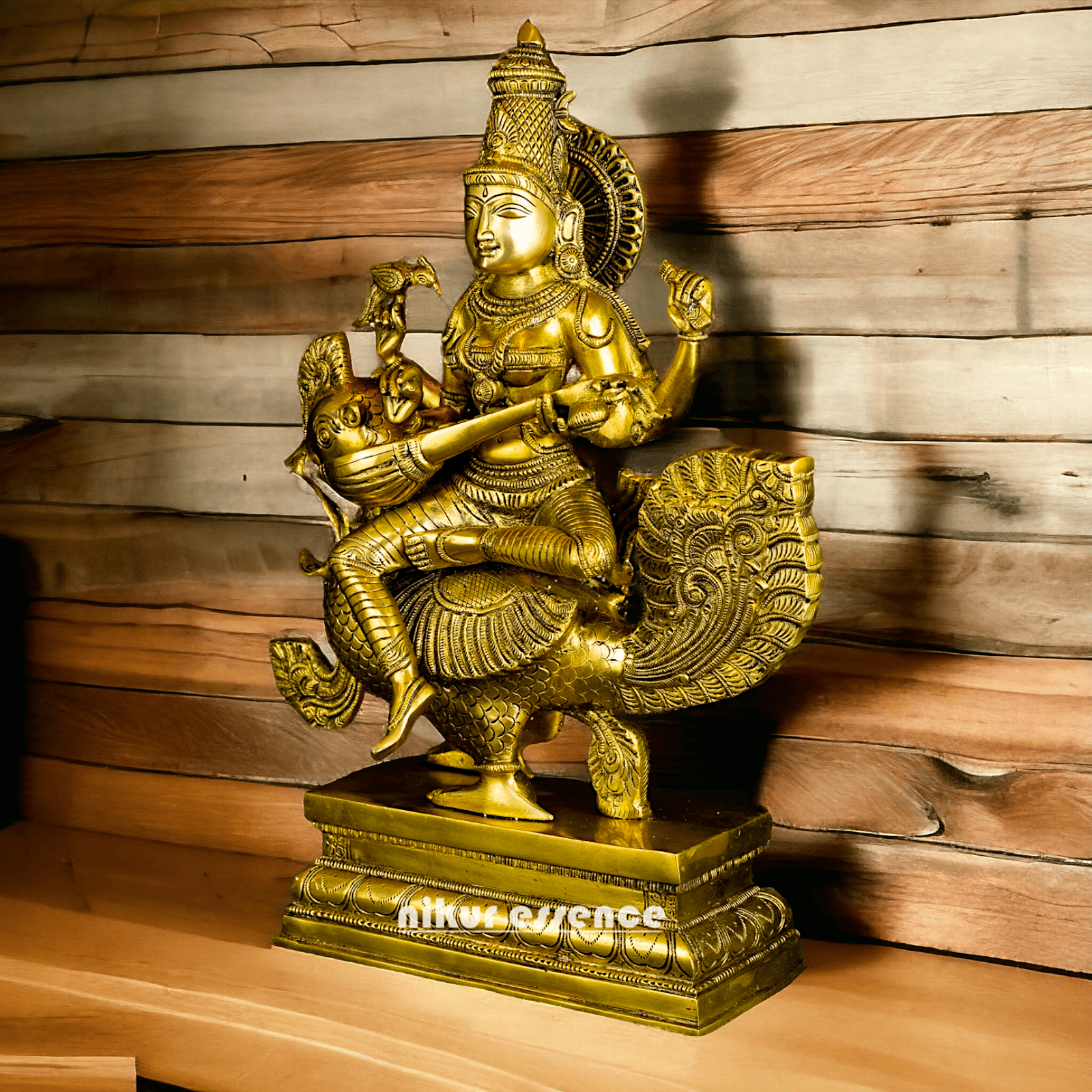 Buy Brass Statue of Devi Sarasvati Seated Gracefully on Her Sacred Peacock Idols Nikuressence