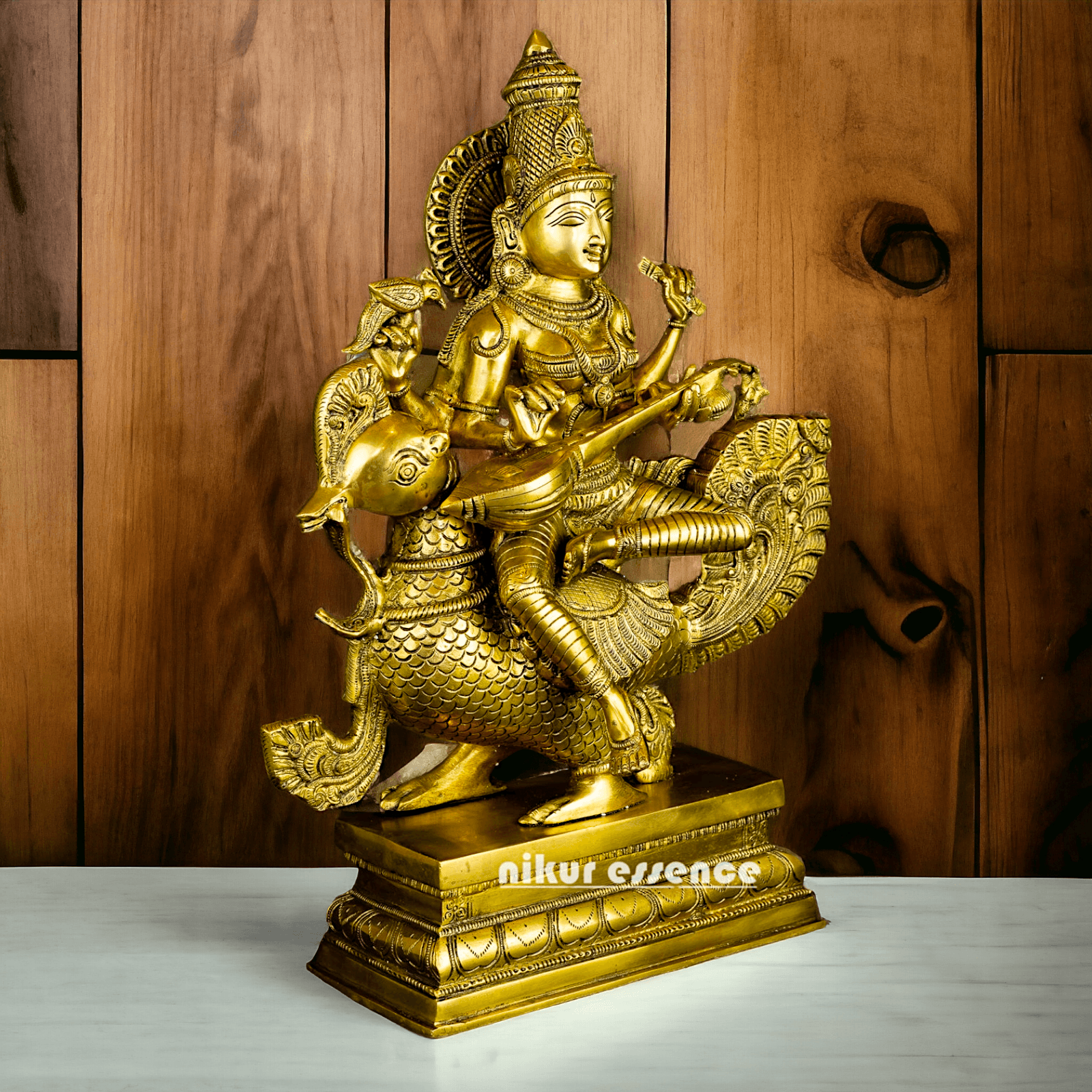 Buy Brass Statue of Devi Sarasvati Seated Gracefully on Her Sacred Peacock Idols Nikuressence