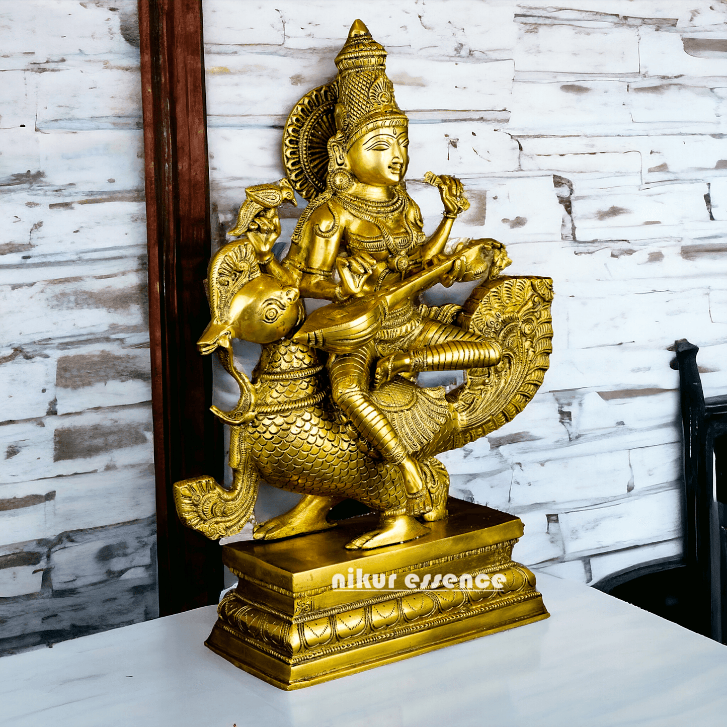 Buy Brass Statue of Devi Sarasvati Seated Gracefully on Her Sacred Peacock Idols Nikuressence