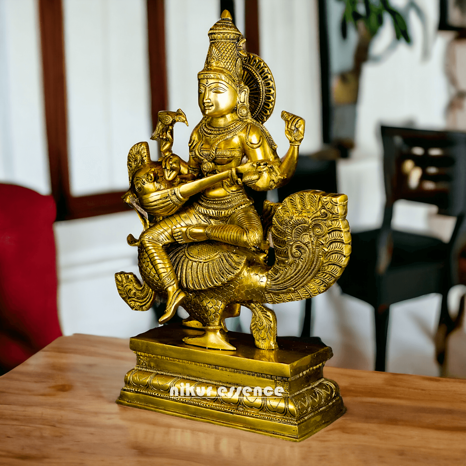 Buy Brass Statue of Devi Sarasvati Seated Gracefully on Her Sacred Peacock Idols Nikuressence