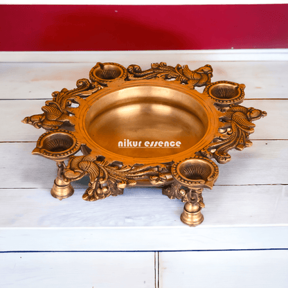 Brass Urli with Intricately Designed 4 Diya Holders for Festive Decor and Spiritual Ambiance Idols Nikuressence