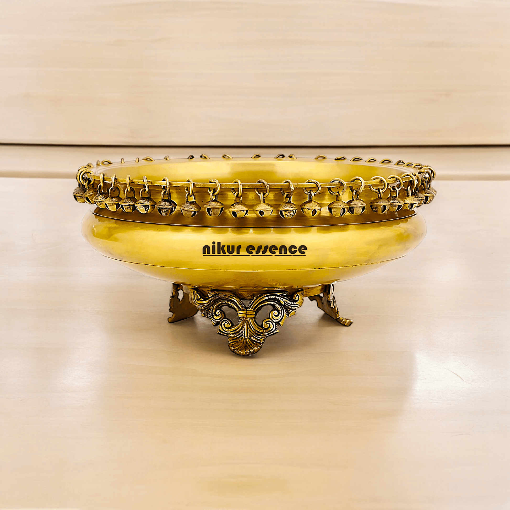 Brass Round Urli with Hanging Bells – Decorative Indian-Style Bowl for Traditional and Contemporary Home Décor by Nikur Essence Idols Nikuressence