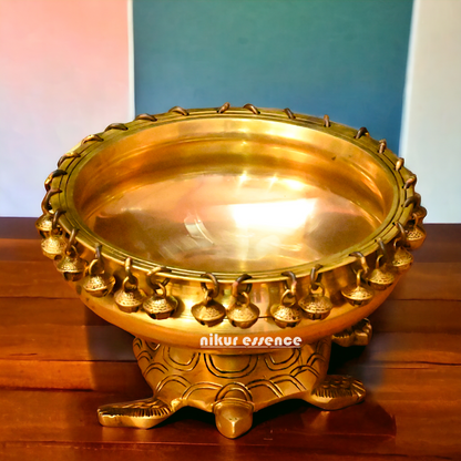 Buy online 8-Inch Traditional Brass Urli with Turtle Design - Handcrafted Decorative Bowl for Home Décor