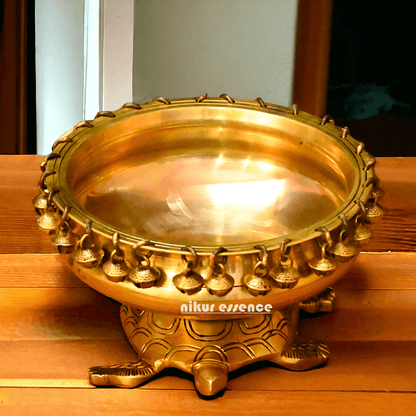 Buy online 8-Inch Traditional Brass Urli with Turtle Design - Handcrafted Decorative Bowl for Home Décor