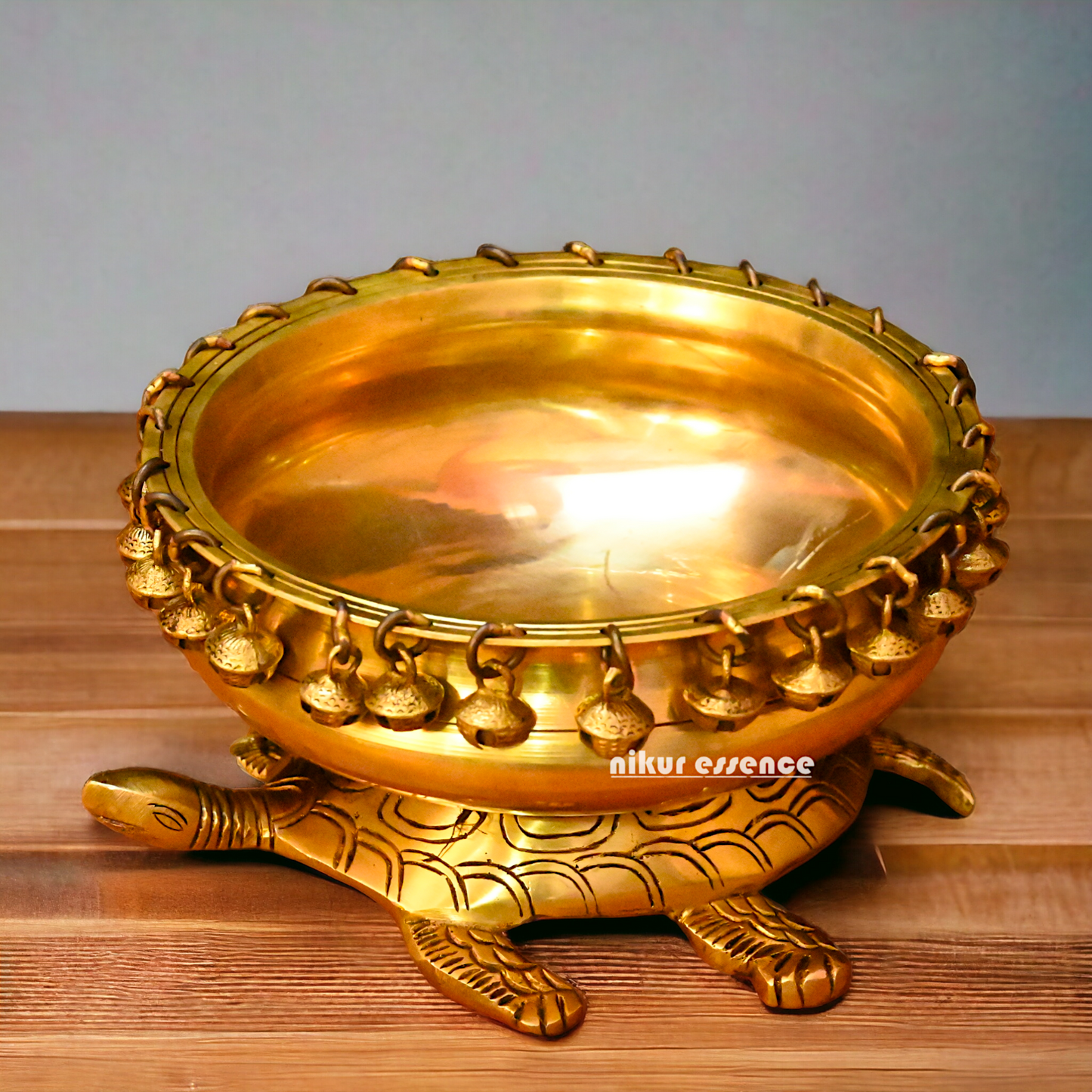 Buy online 8-Inch Traditional Brass Urli with Turtle Design - Handcrafted Decorative Bowl for Home Décor