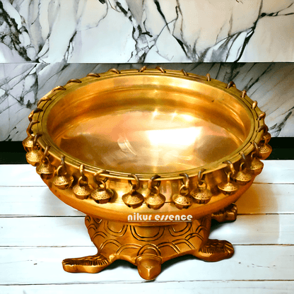 Buy online 8-Inch Traditional Brass Urli with Turtle Design - Handcrafted Decorative Bowl for Home Décor