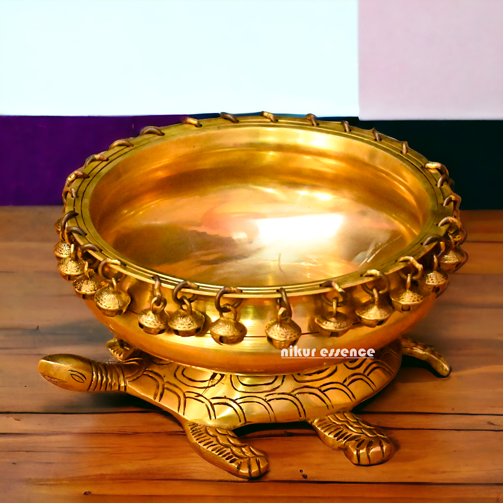 Buy online 8-Inch Traditional Brass Urli with Turtle Design - Handcrafted Decorative Bowl for Home Décor