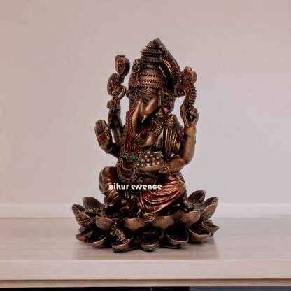 Bonded Bronze Ganesh sitting on lotus Nikur Essence - 4 inch Idols Nikuressence