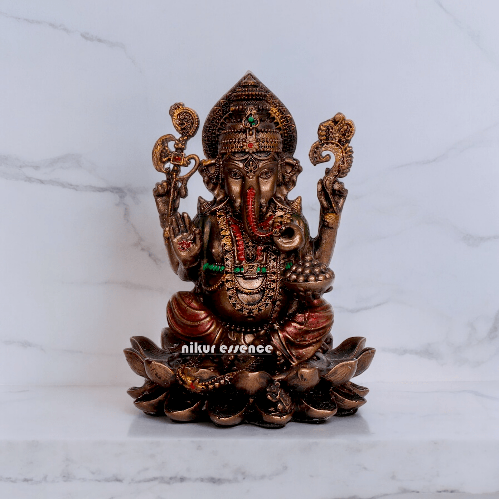 Bonded Bronze Ganesh sitting on lotus Nikur Essence - 4 inch Idols Nikuressence