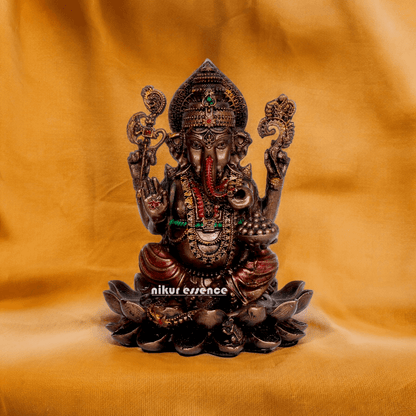 Bonded Bronze Ganesh sitting on lotus Nikur Essence - 4 inch Idols Nikuressence