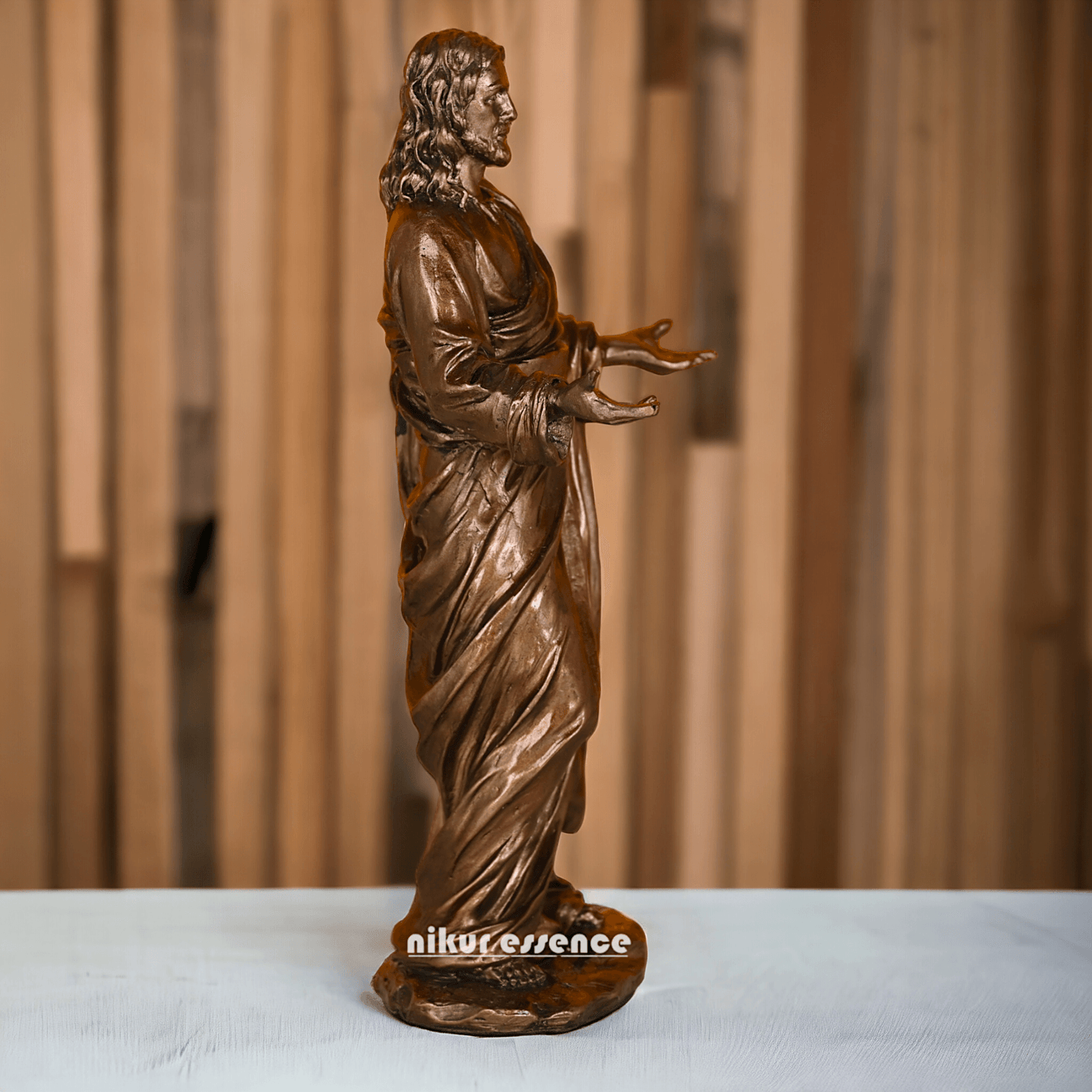 Buy bronze Jesus Christ Figurine, 23 cm Tall, Crafted in Bonded Bronze with Impeccable Detailing Nikuressence Artistic Home Decor Bronze decor Bronze Jesus Christ Bronze Jesus Christ Figure Bronze Religious Statues decor items for diwali decorative handicrafts handicraft home decor items Jesus Christ Bronze Statue