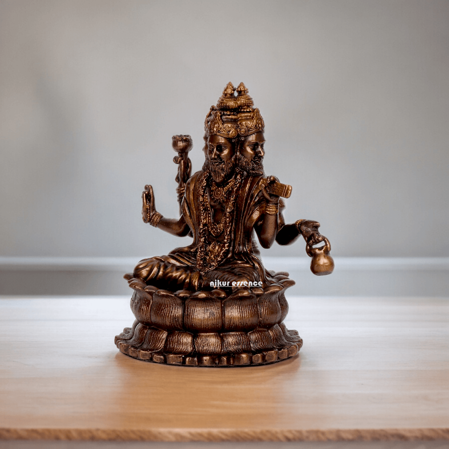 Bonded Bronze Trimurti Idol Depicting Brahma, Vishnu, and Mahesh on Lotus by Nikur Essence - 3.75 Inch