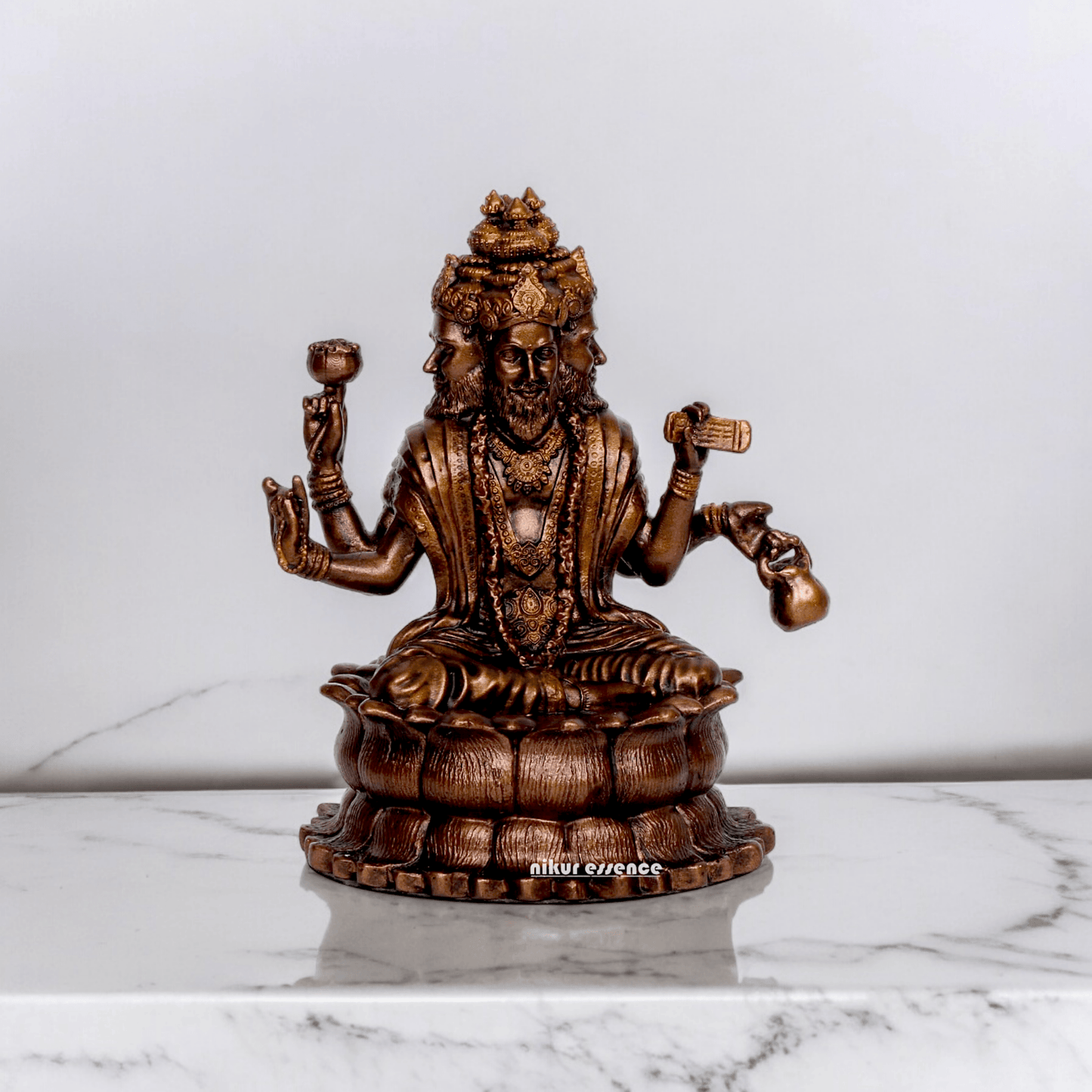 Bonded Bronze Trimurti Idol Depicting Brahma, Vishnu, and Mahesh on Lotus by Nikur Essence - 3.75 Inch