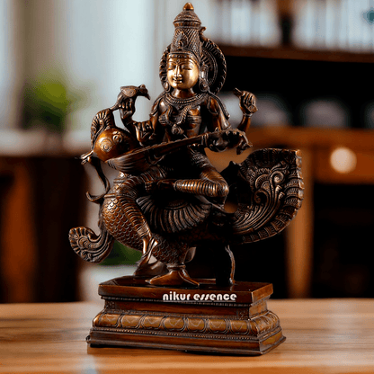 Saraswati Playing the Veena While Seated on a Grand Peacock, With a Parrot Gracefully Perched on Her Hand – Exquisite 20-Inch Handcrafted Figurine Idols Nikuressence