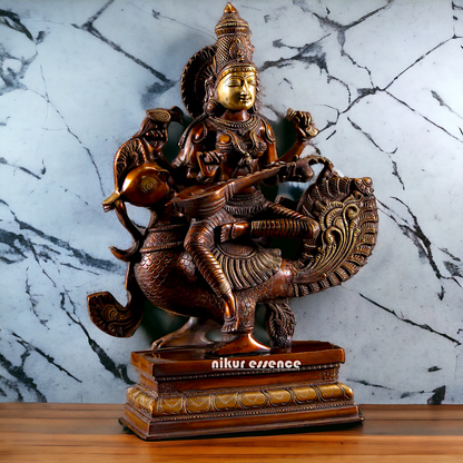 Saraswati Playing the Veena While Seated on a Grand Peacock, With a Parrot Gracefully Perched on Her Hand – Exquisite 20-Inch Handcrafted Figurine Idols Nikuressence