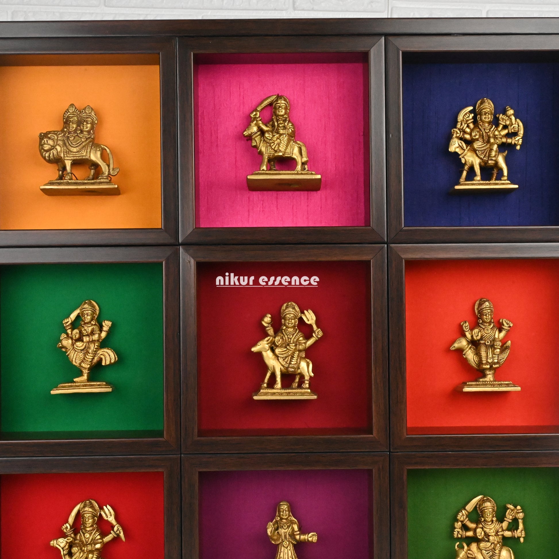 Nav Durga brass idols in colorful wooden frame - 20 inches