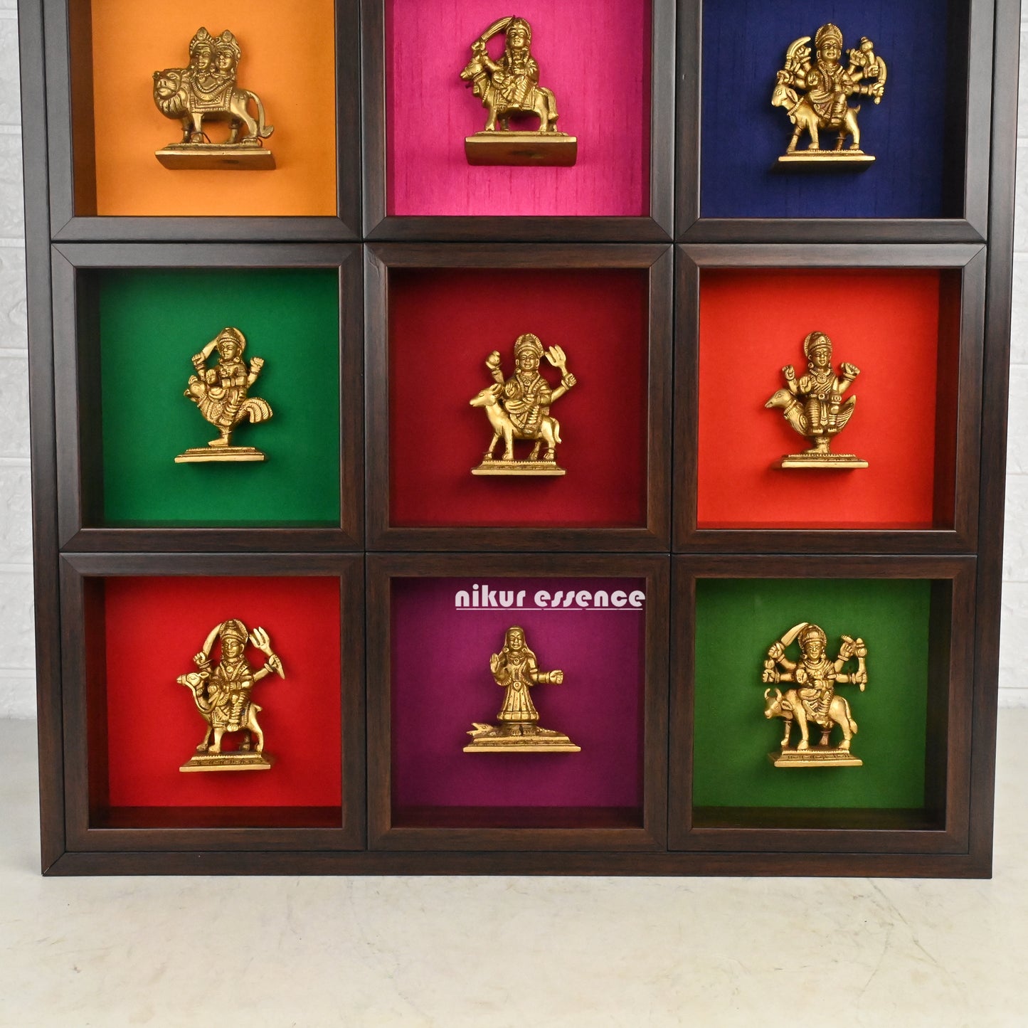 Nav Durga brass idols in colorful wooden frame - 20 inches