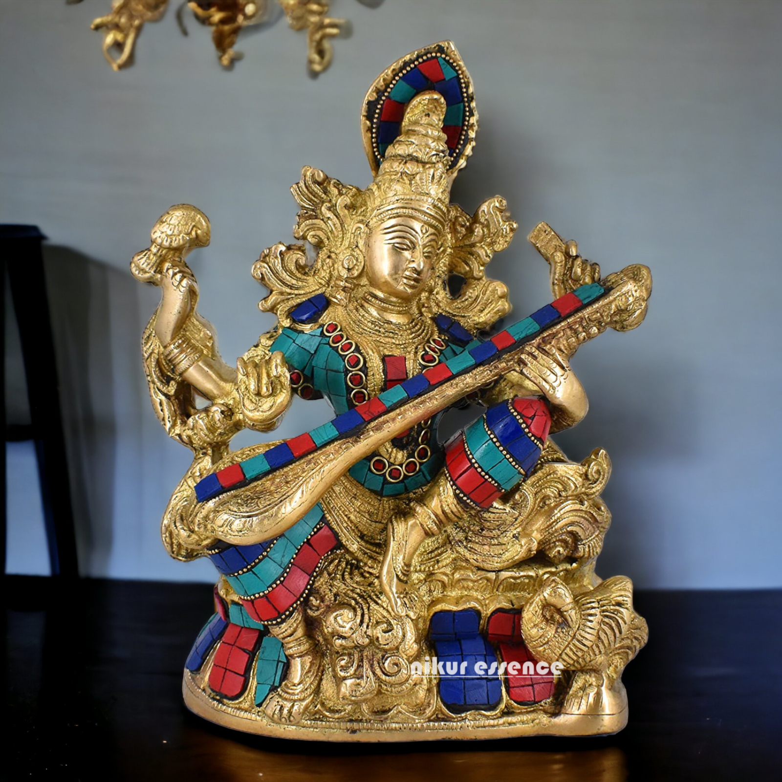 online Brass Saraswati Sitting playing veena idol with Stone work - 11.5 inches