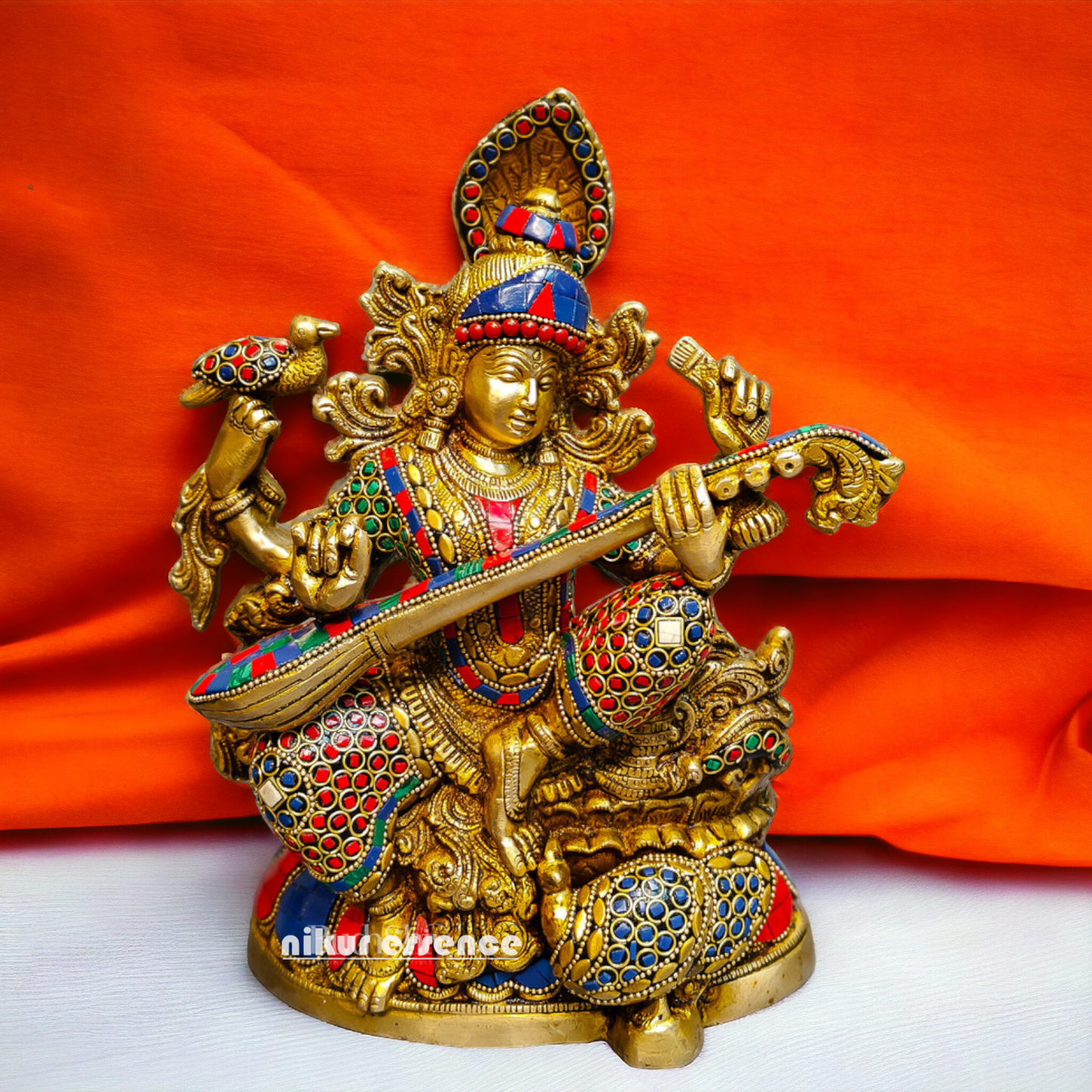 Buy Brass Saraswati Sitting Playing Veena with Stone Work - 27 cm