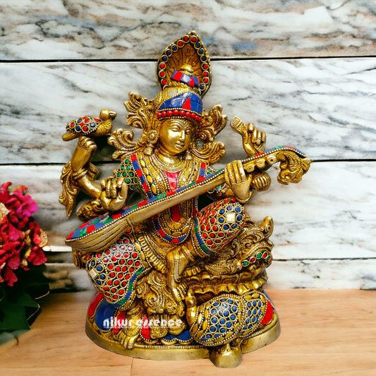 Buy Brass Saraswati Sitting Playing Veena with Stone Work - 27 cm