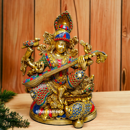 Buy Brass Saraswati Sitting Playing Veena with Stone Work - 27 cm