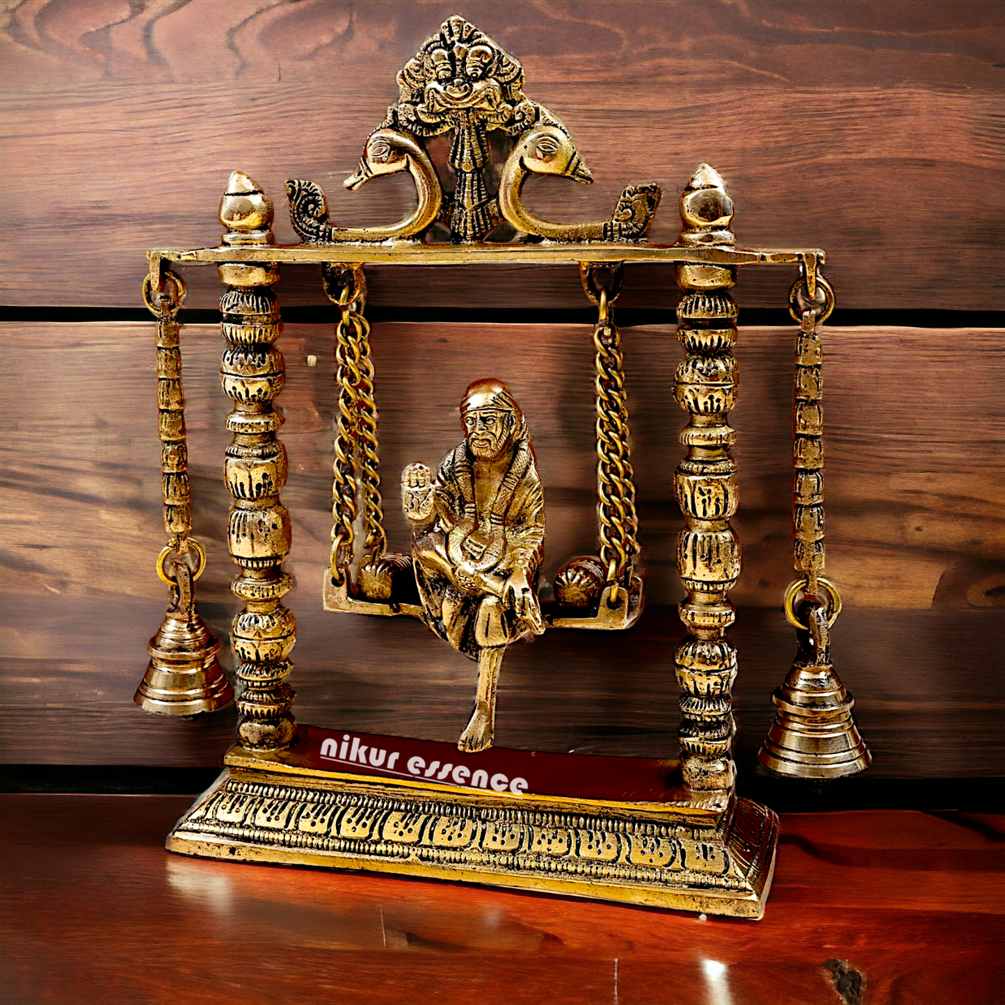 buy Sai Baba swinging Jhula Solid brass idol - 10 inches