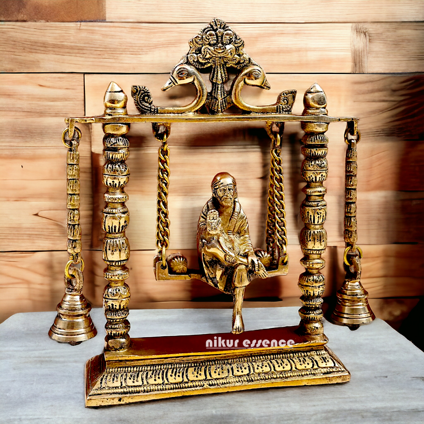 buy Sai Baba swinging Jhula Solid brass idol - 10 inches