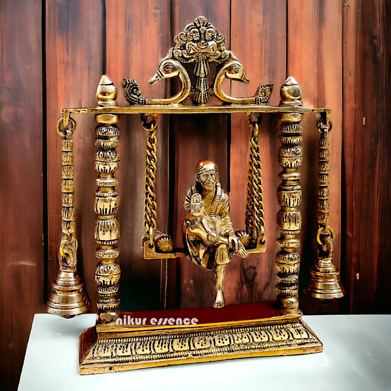 buy Sai Baba swinging Jhula Solid brass idol - 10 inches