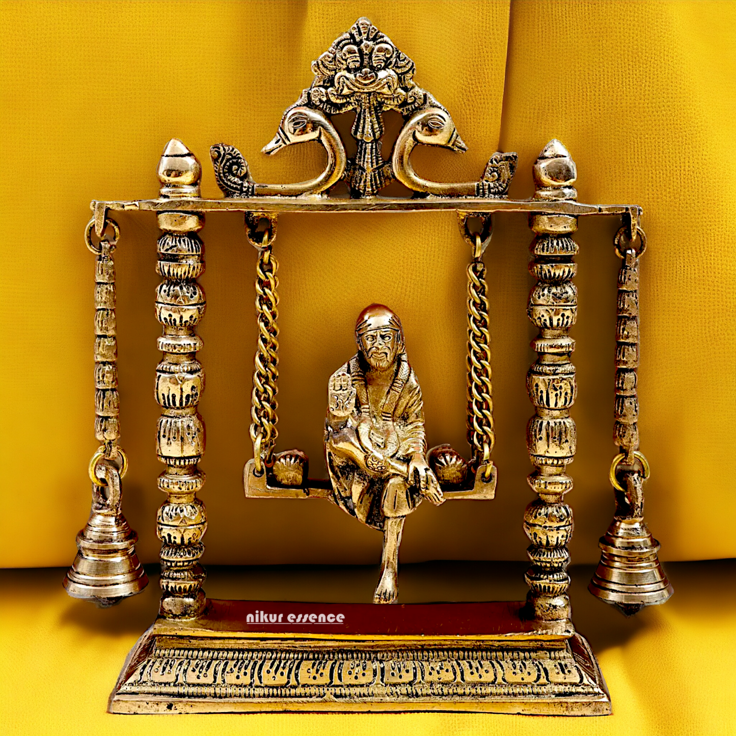 buy Sai Baba swinging Jhula Solid brass idol - 10 inches