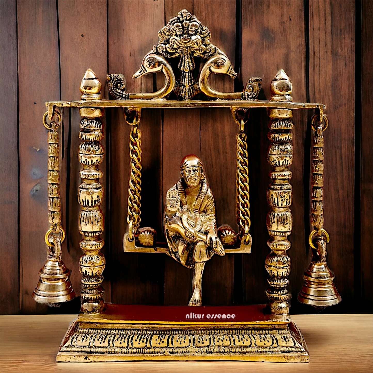 buy Sai Baba swinging Jhula Solid brass idol - 10 inches