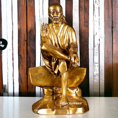 Pure Brass Sai Baba Sitting on Stone idol - 12 inches