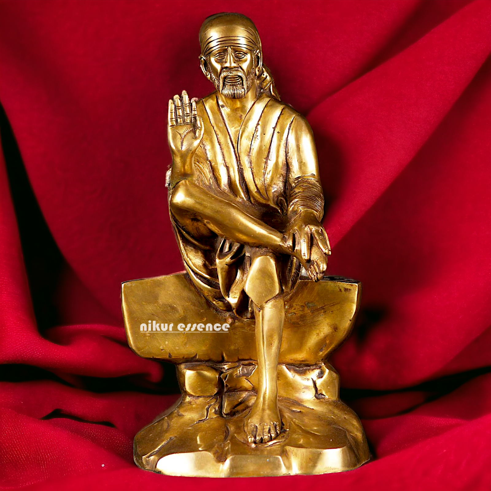 Pure Brass Sai Baba Sitting on Stone idol - 12 inches